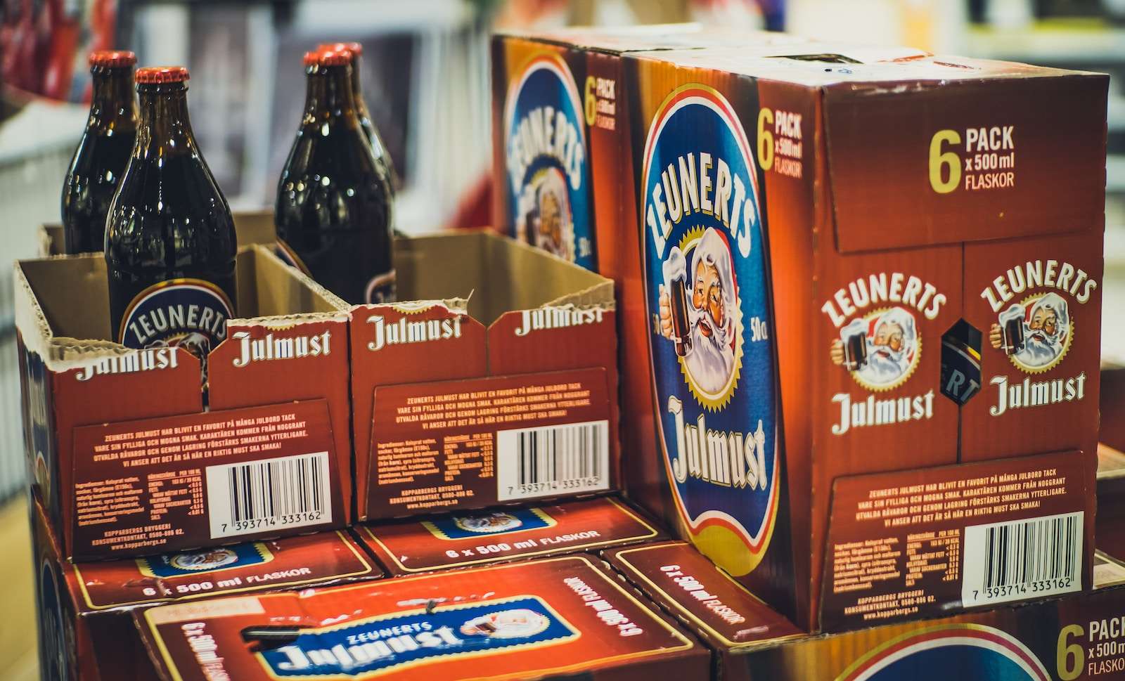 several bottles of beer are stacked on top of each other